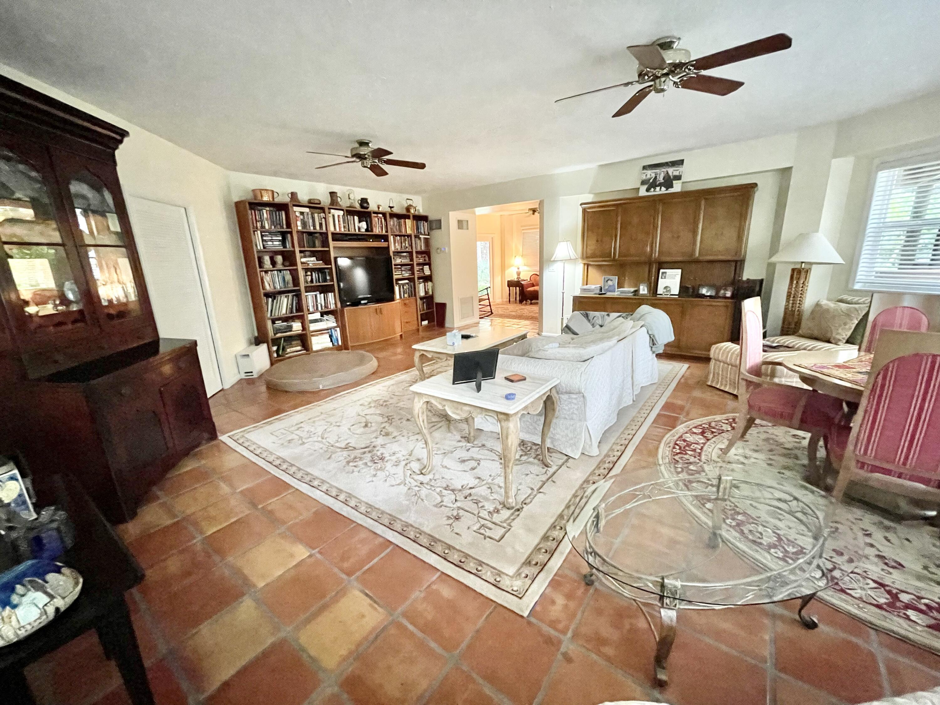 9470 Sandy Run Road Jupiter, FL 33478 - Photo 41 of 48 a view of a living room and dining room
