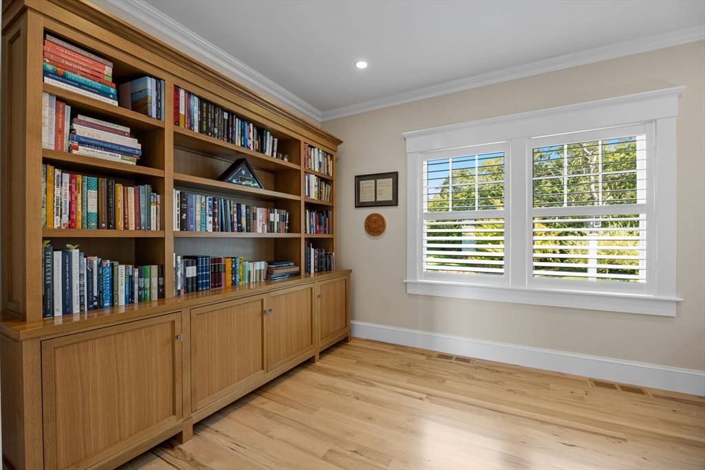246 Stage Island Road Chatham, MA 02633 - Photo 22 of 37 a room with bookshelf and a window