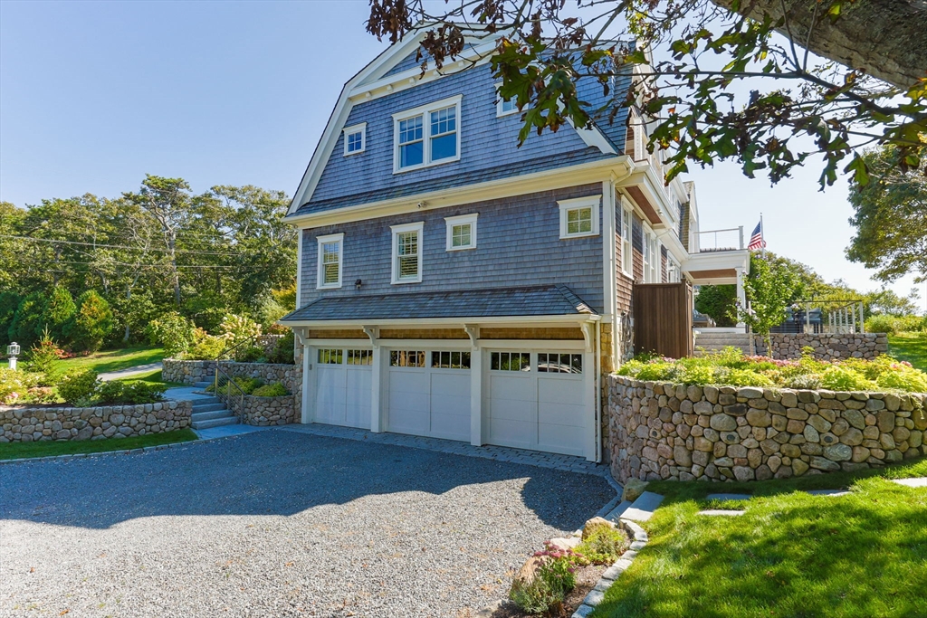 246 Stage Island Road Chatham, MA 02633 - Photo 35 of 37 a front view of a house with a yard