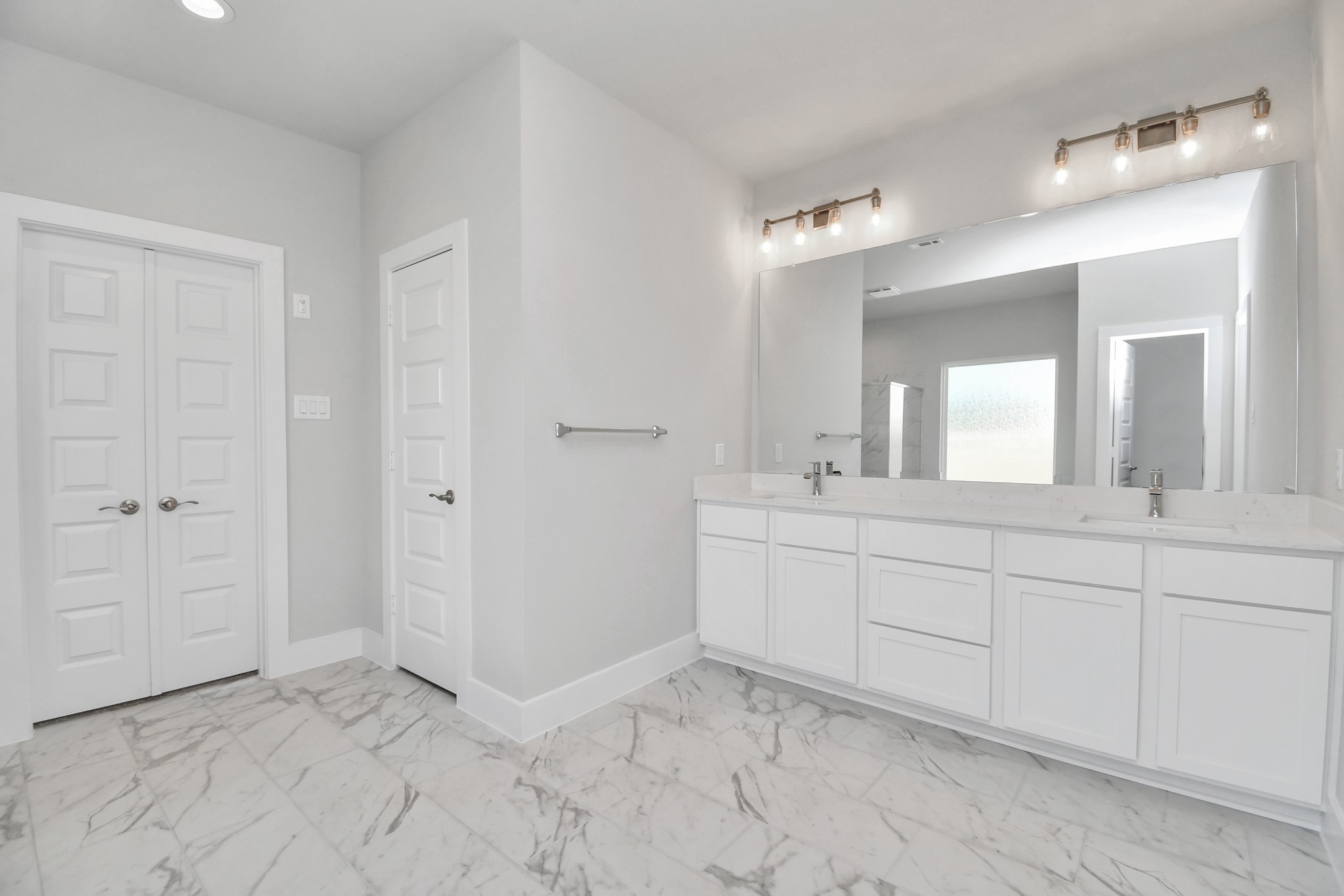 3103 Native Spg Drive Spring, TX 77373 - Photo 22 of 36 a bathroom with a sink and a mirror