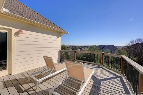 a view of a terrace with a lounge chair
