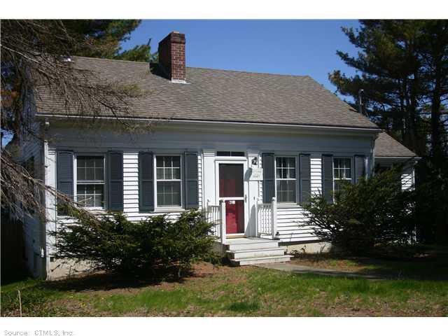 128 Elm Street Groton, CT 06340 - Photo 1 of 1 a front view of a house with garden