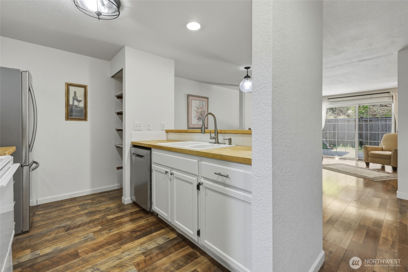 6005 Merlot Lane Southeast Lacey, WA 98513 - Photo 14 of 37 a spacious bathroom with a sink a mirror and a shower