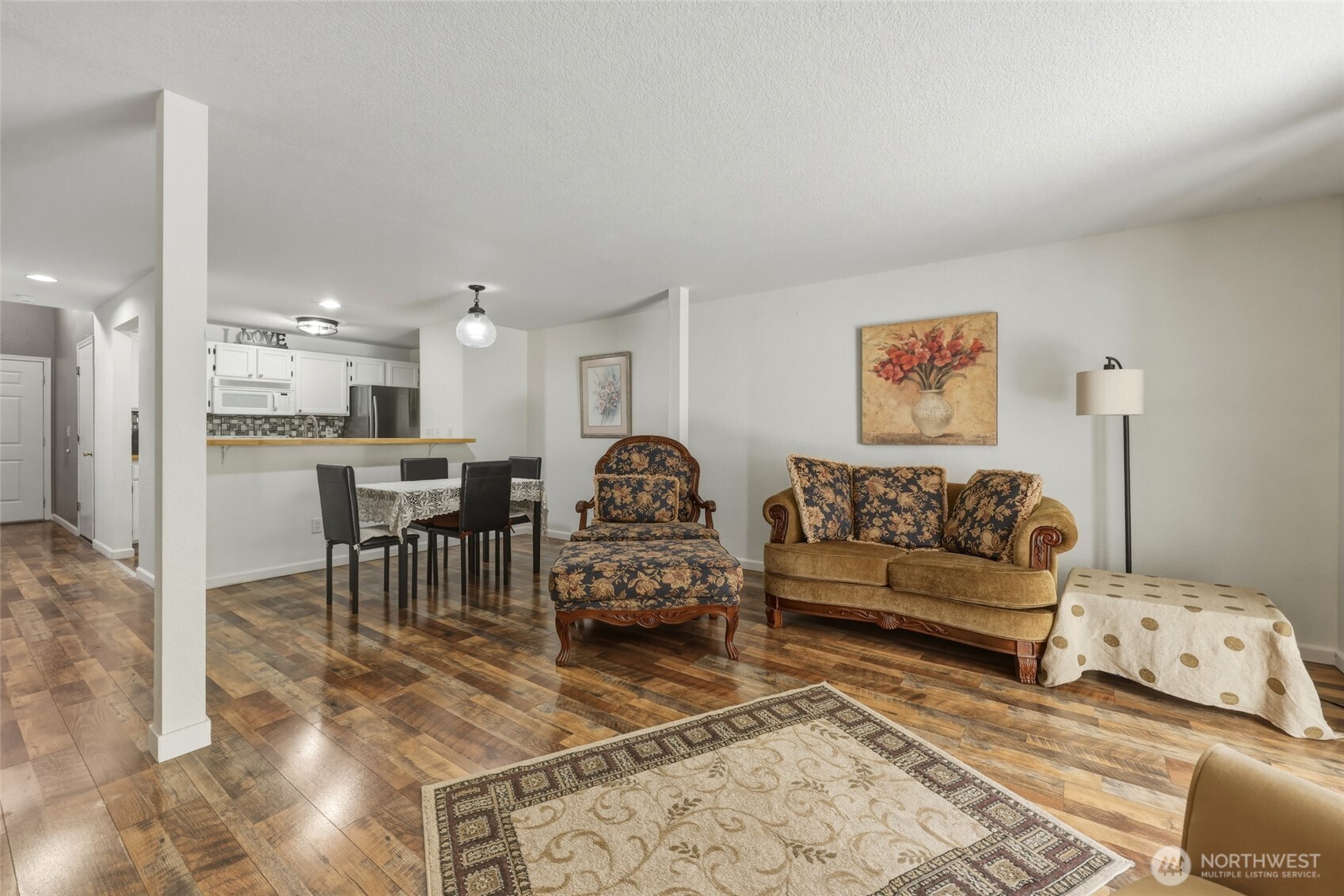 6005 Merlot Lane Southeast Lacey, WA 98513 - Photo 19 of 37 a living room with furniture and a table