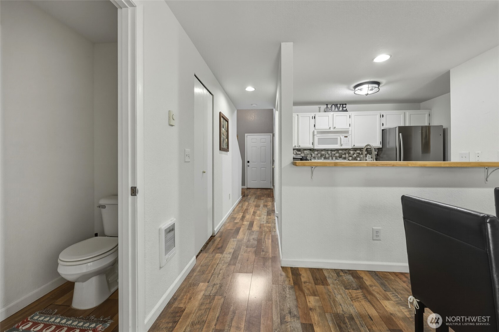 6005 Merlot Lane Southeast Lacey, WA 98513 - Photo 23 of 37 a bathroom with a sink and a toilet