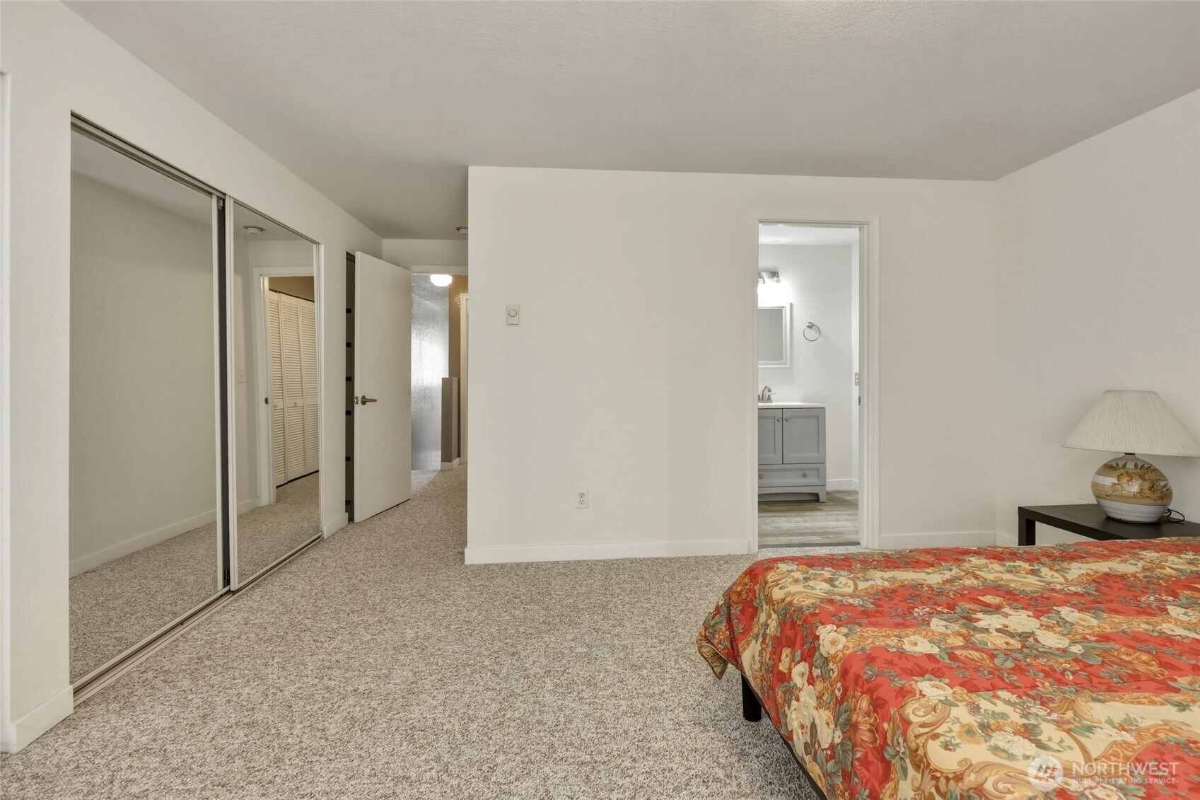 6005 Merlot Lane Southeast Lacey, WA 98513 - Photo 28 of 37 a bedroom with a bed and a cabinets