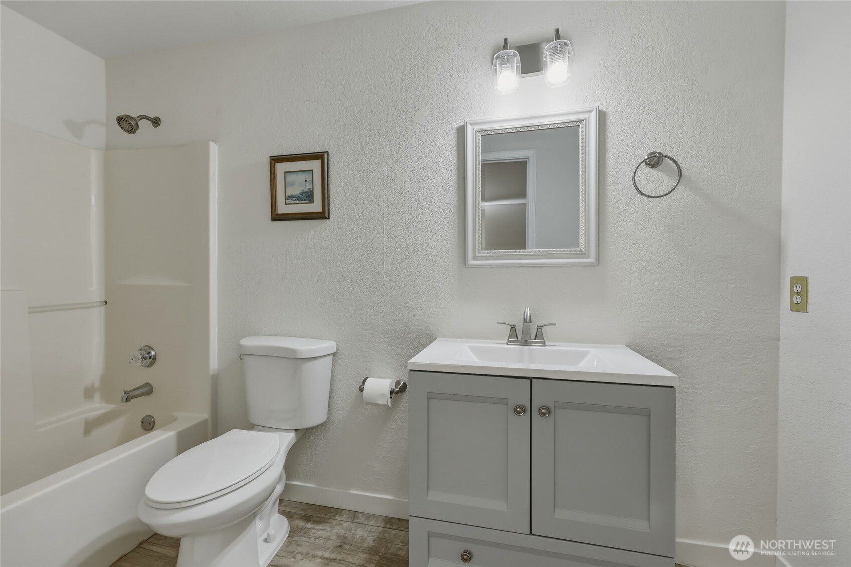 6005 Merlot Lane Southeast Lacey, WA 98513 - Photo 29 of 37 a bathroom with a sink toilet and shower