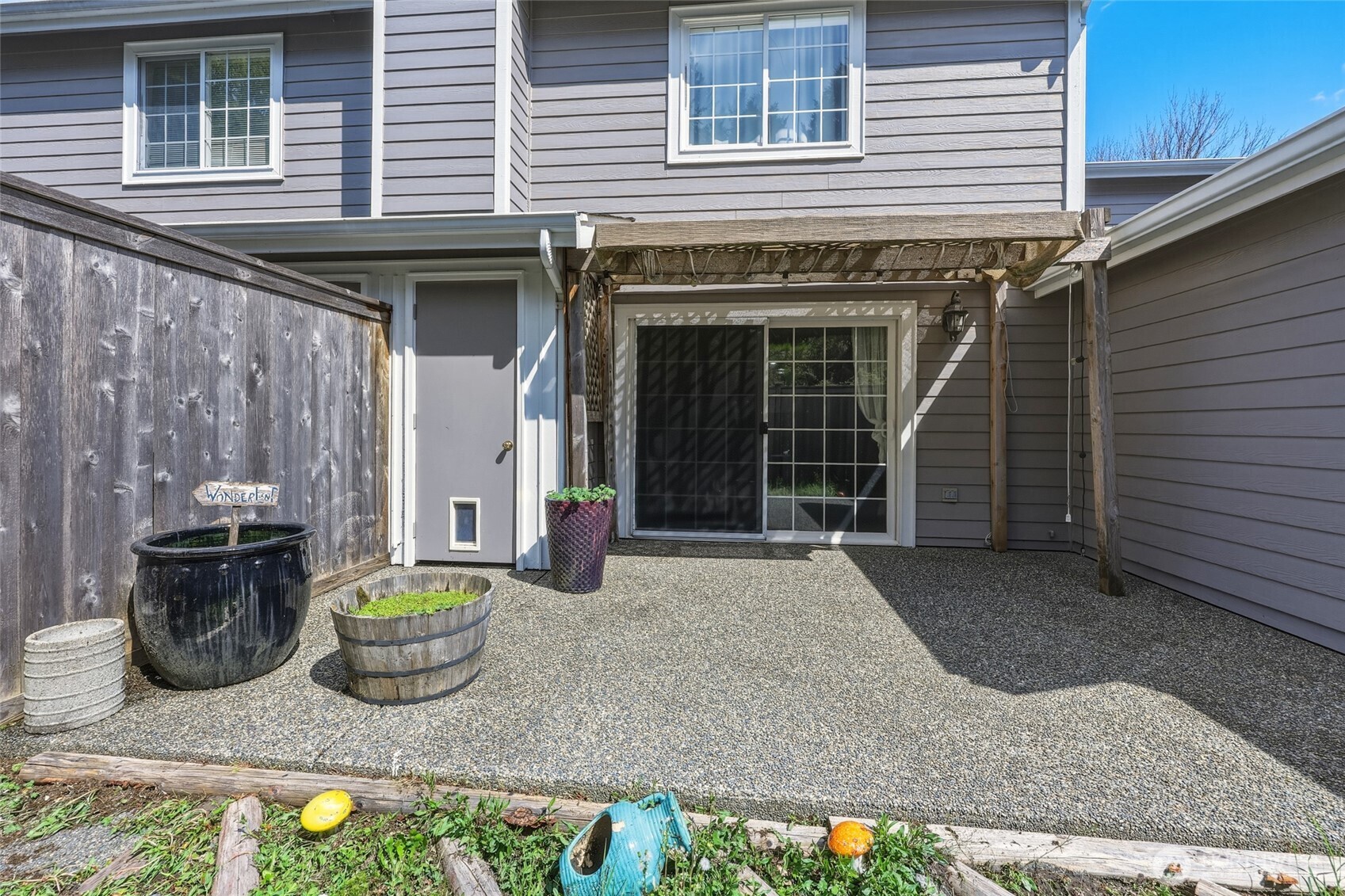6005 Merlot Lane Southeast Lacey, WA 98513 - Photo 3 of 37 a view of a house with outdoor seating space