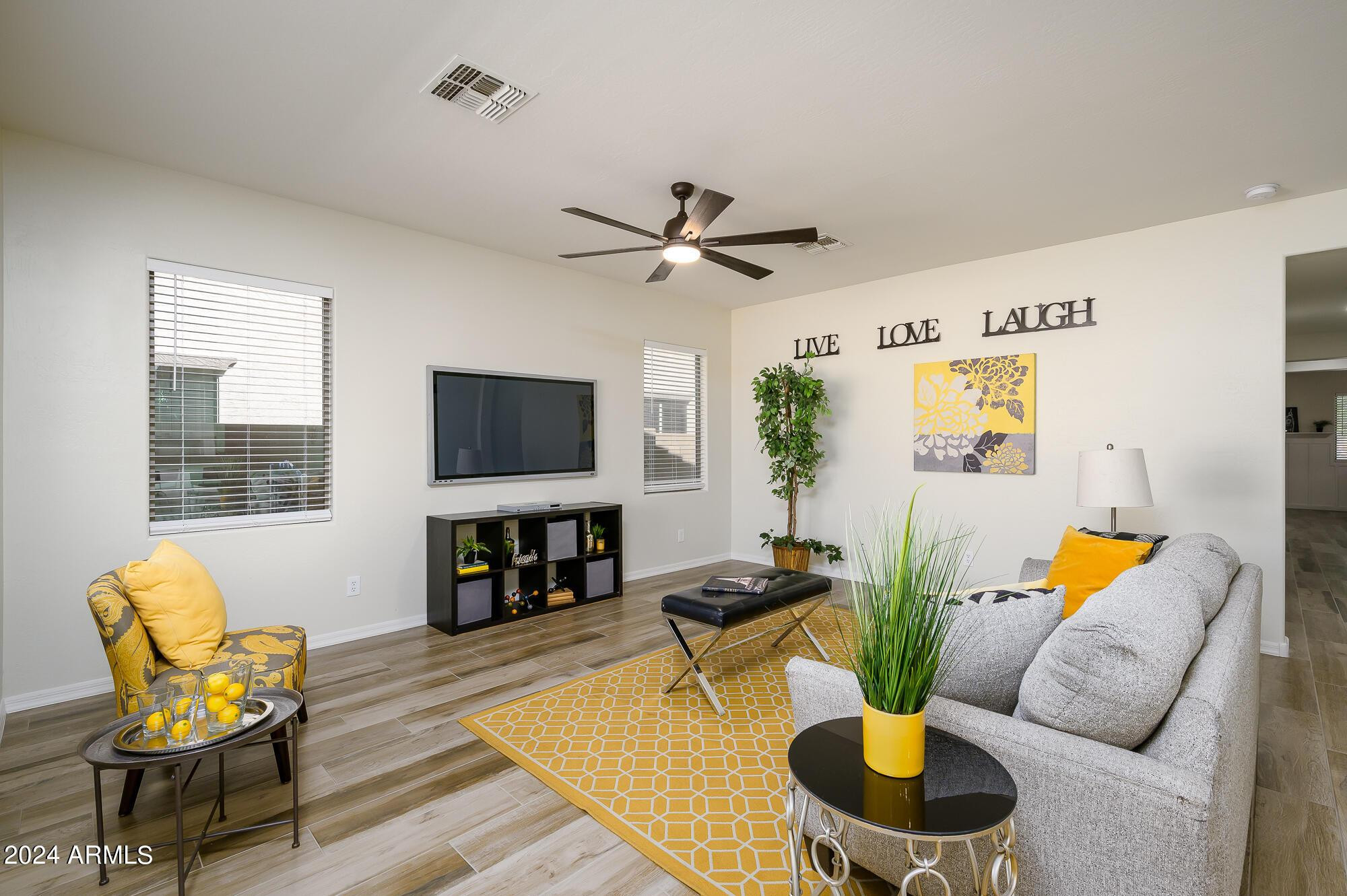 17618 West Crocus Drive Surprise, AZ 85388 - Photo 13 of 34 a living room with furniture kitchen view and a window