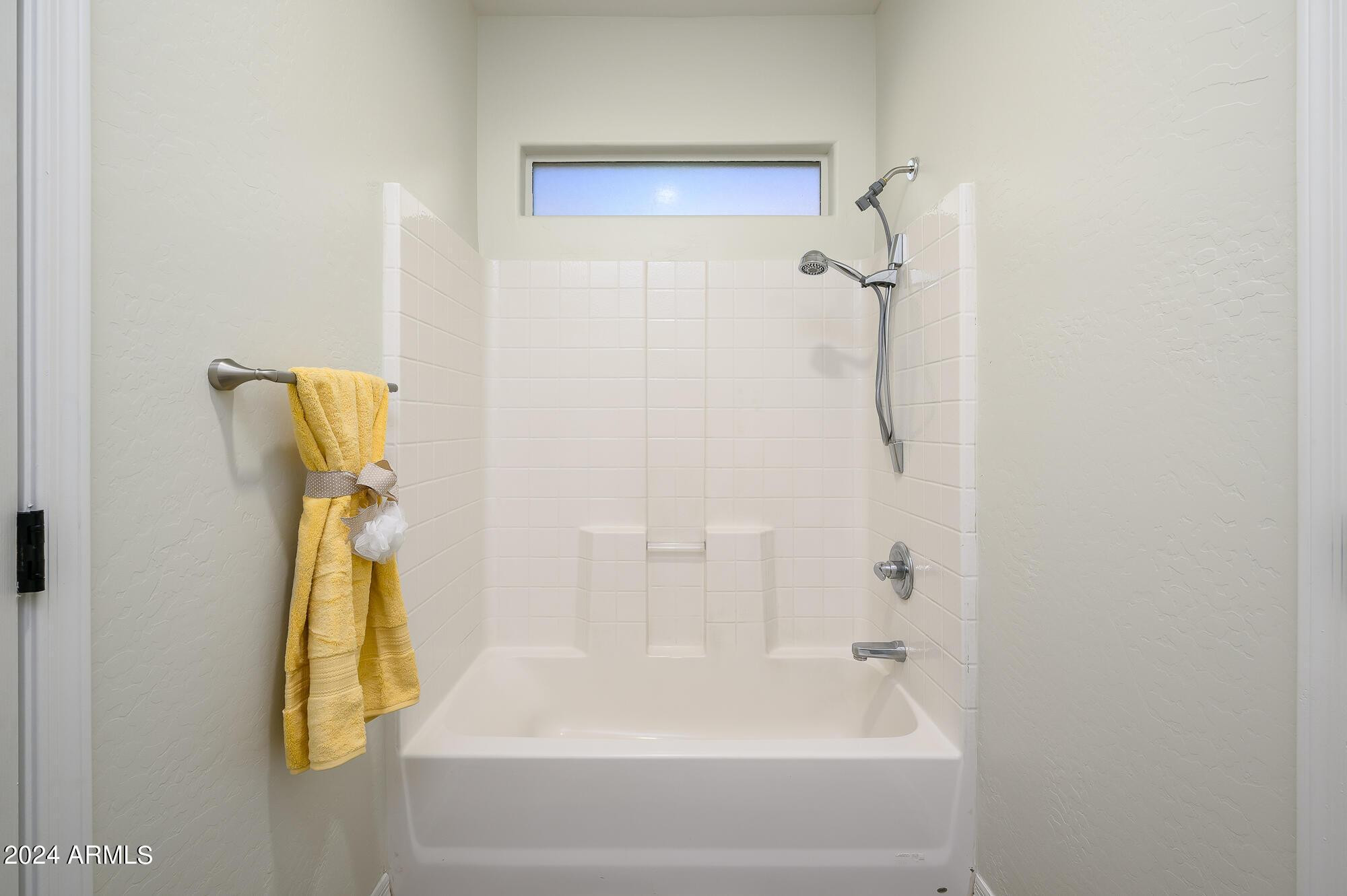 17618 West Crocus Drive Surprise, AZ 85388 - Photo 28 of 34 a bathroom with a shower