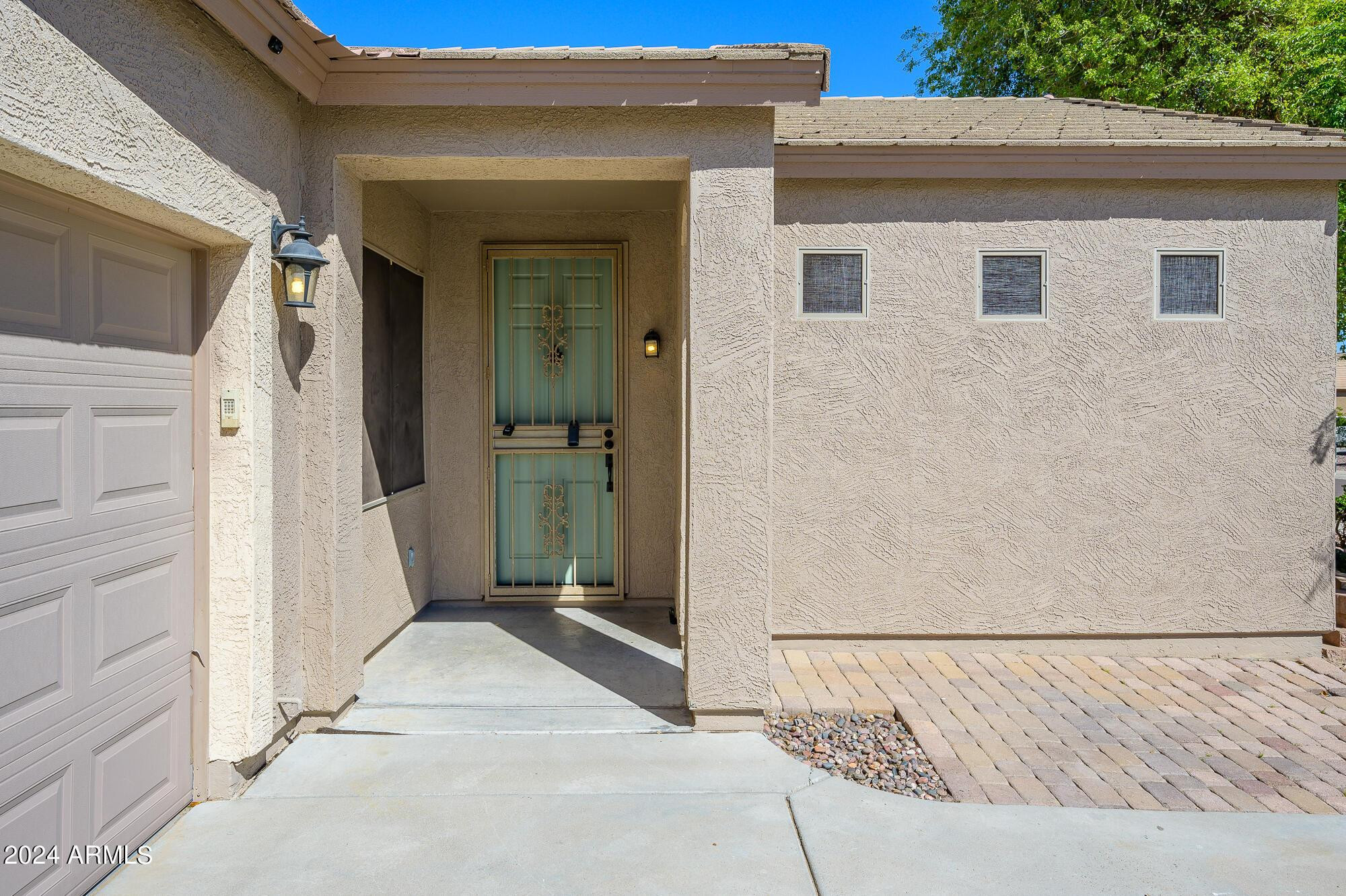 17618 West Crocus Drive Surprise, AZ 85388 - Photo 3 of 34 a view of a house with a wooden fence