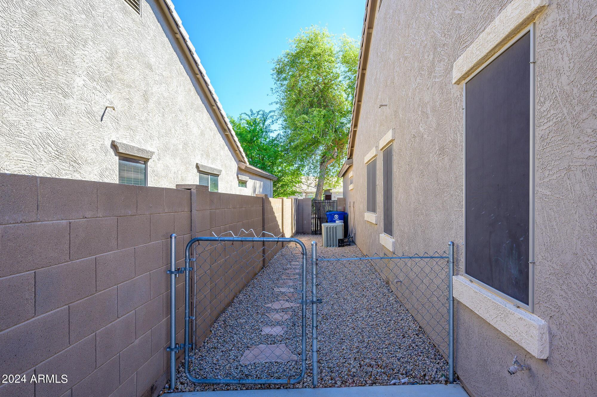 17618 West Crocus Drive Surprise, AZ 85388 - Photo 33 of 34 a view of a house with a backyard