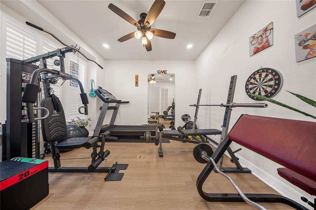 8252 Randal Park Boulevard Orlando, FL 32832 - Photo 4 of 63 a view of a room with gym equipment
