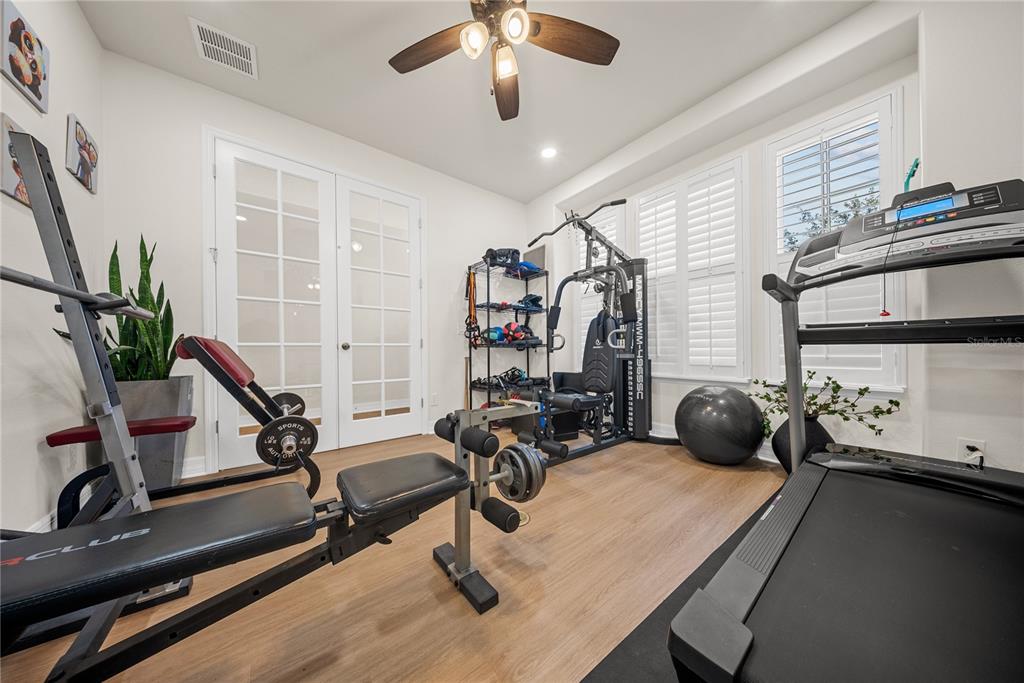 8252 Randal Park Boulevard Orlando, FL 32832 - Photo 5 of 63 a view of a room with gym equipment