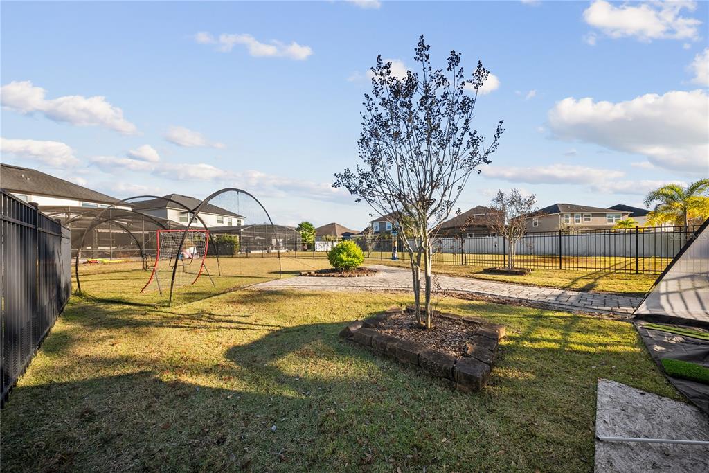 8252 Randal Park Boulevard Orlando, FL 32832 - Photo 56 of 63 a view of swimming pool with outdoor seating and yard in back