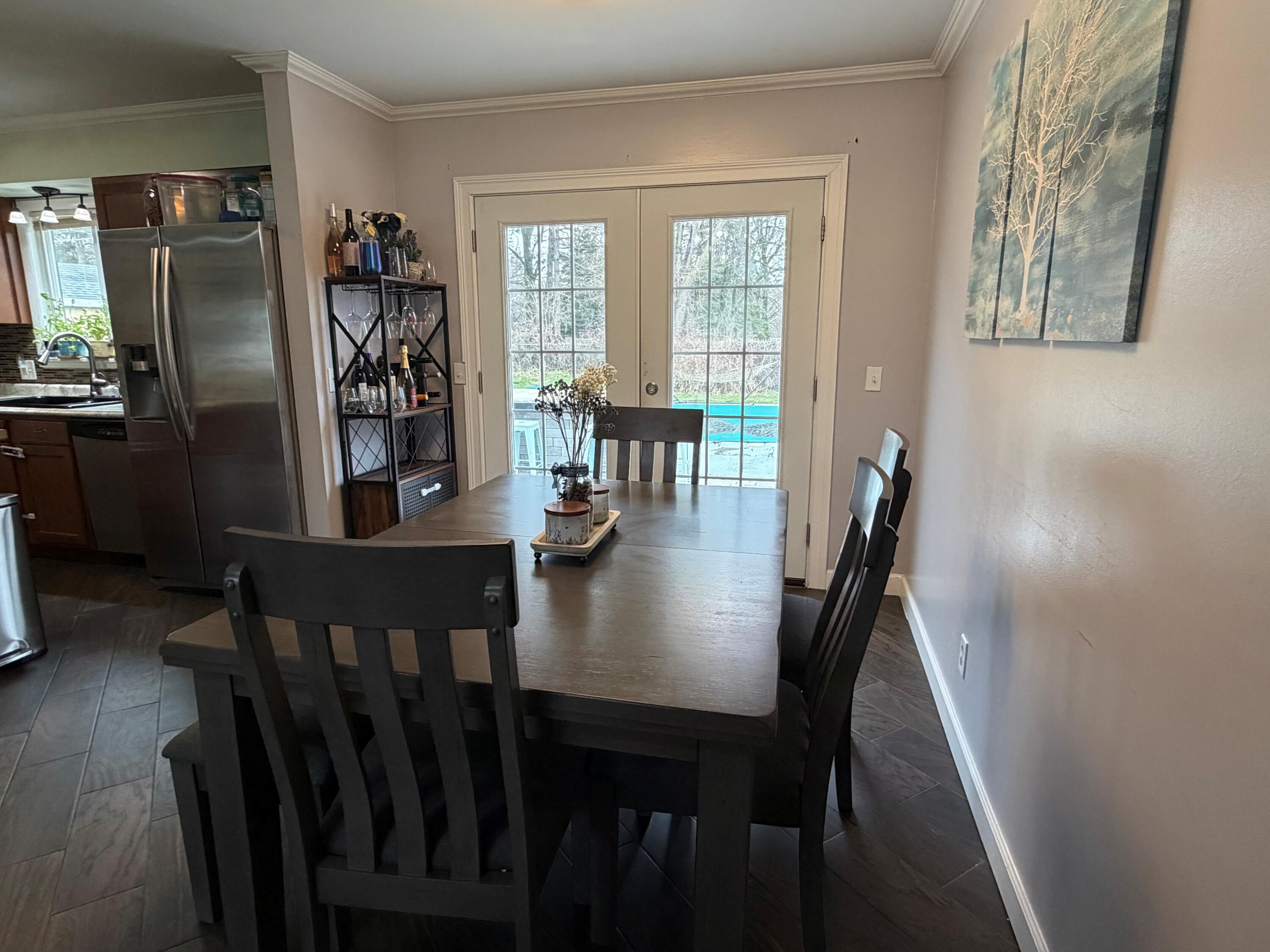 3733 Ridgefield Road Lansing, MI 48906 - Photo 9 of 31 KITCHEN FRENCH DOORS TO POOL