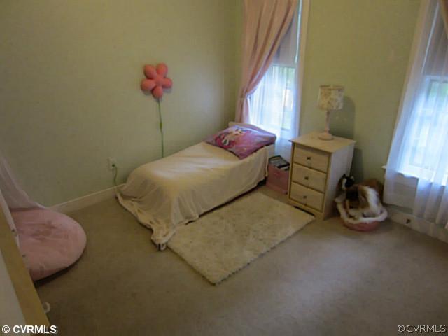 7950 Millvale Road Chesterfield, VA 23832 - Photo 12 of 18 a bedroom with a bed and a window