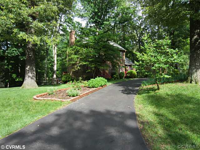 7950 Millvale Road Chesterfield, VA 23832 - Photo 18 of 18 a view of a street with a tree