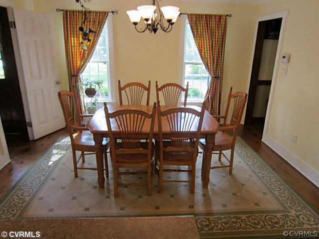 7950 Millvale Road Chesterfield, VA 23832 - Photo 5 of 18 a view of a dining room with furniture window and wooden floor