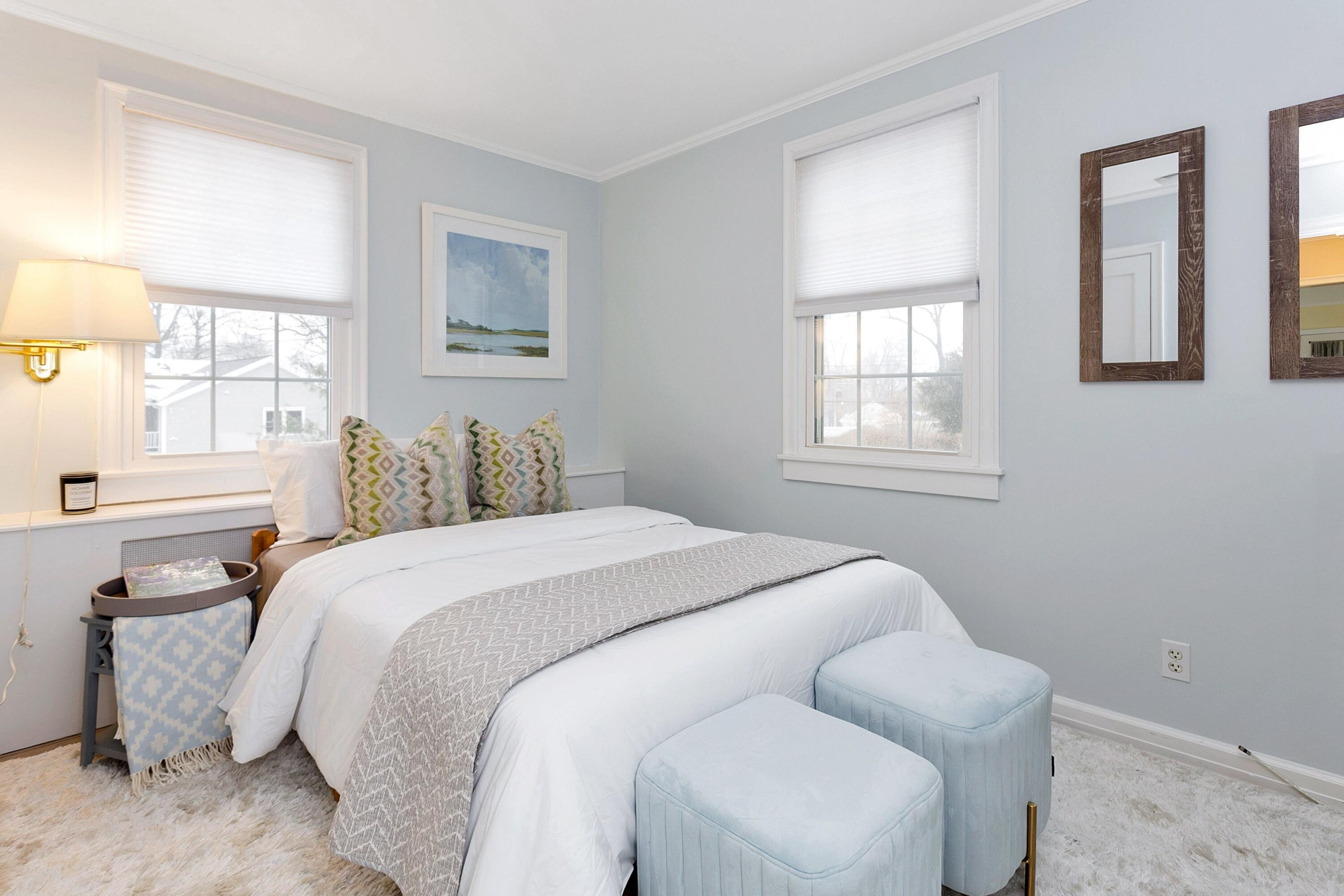 39 Walmsley Road Darien, CT 06820 - Photo 14 of 34 a bedroom with bed and window
