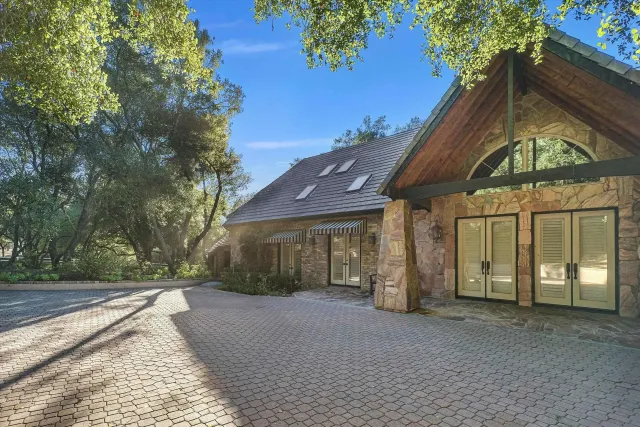 a kitchen with granite countertop a sink and a window