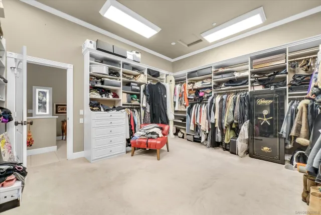 an aerial view of a house with a swimming pool