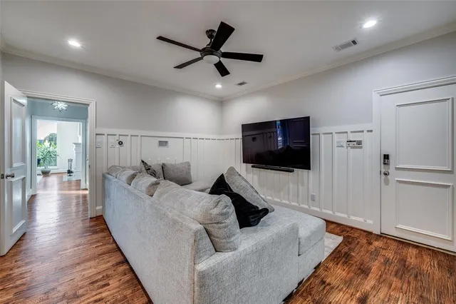 a bathroom with a granite countertop sink a mirror and shower