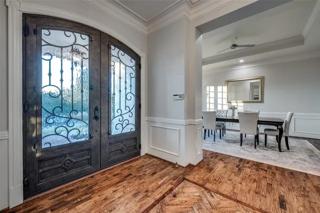 a living room with furniture a rug and a window
