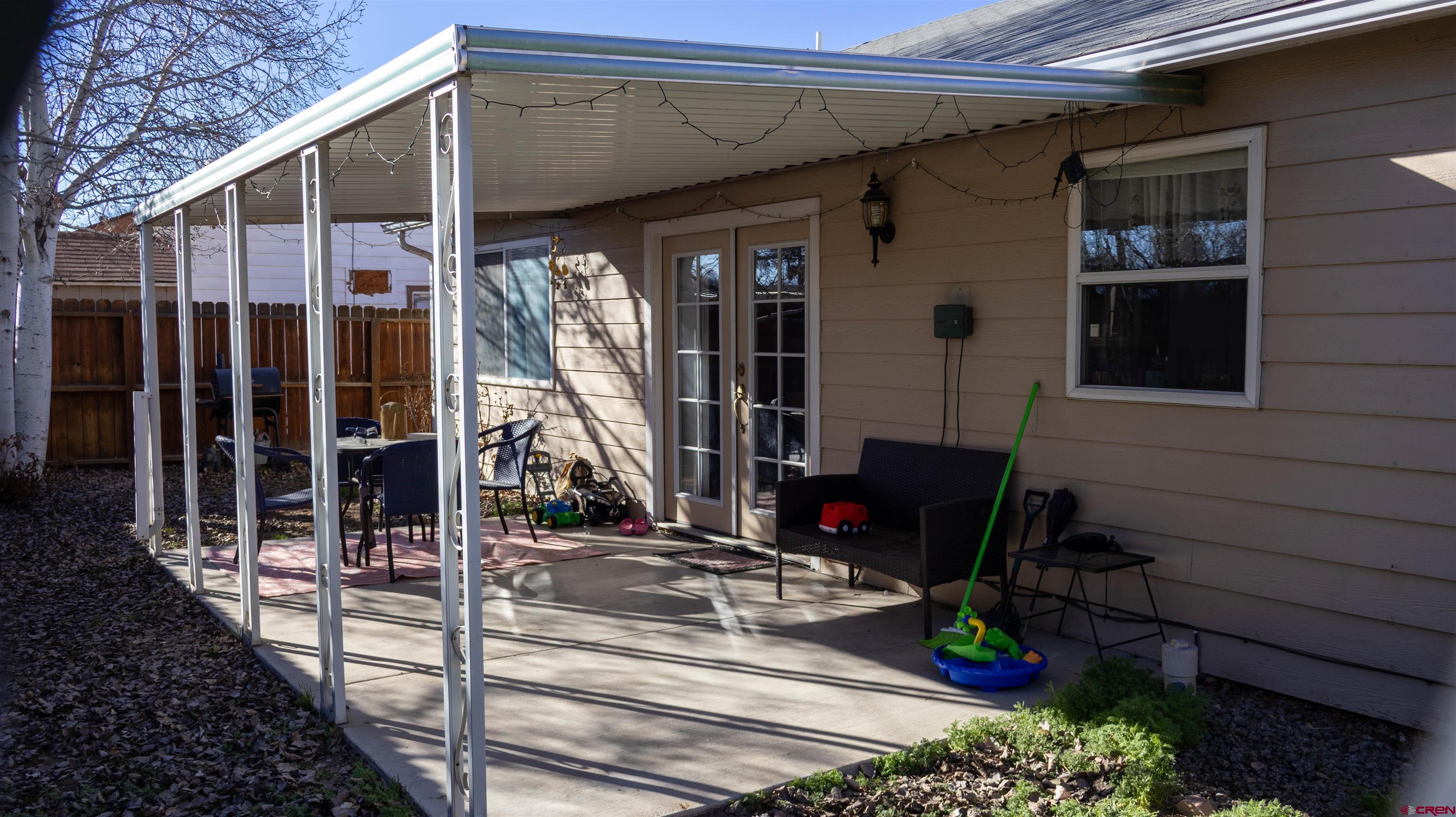 304 West 3rd Street Delta, CO 81416 - Photo 18 of 28 a view of a house with potted plants