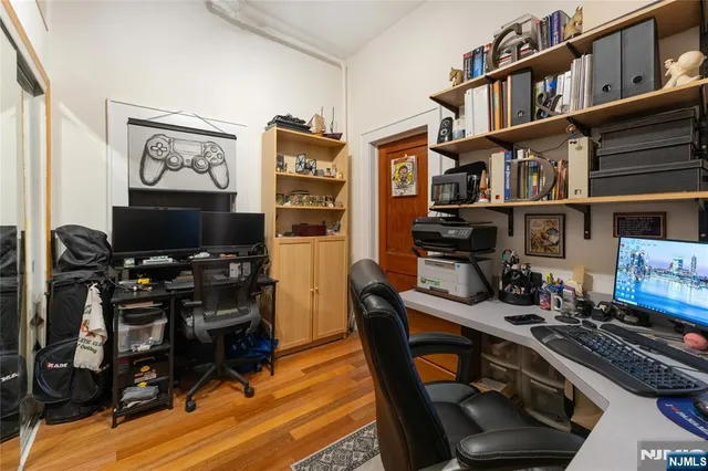 a kitchen with granite countertop a sink and cabinets