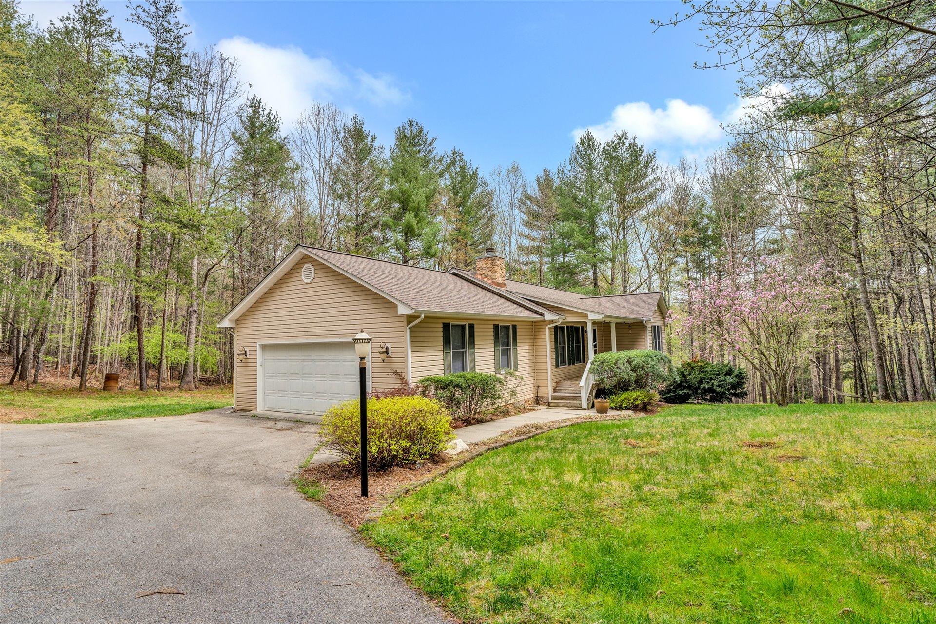 445 Middle Ridge Drive Callaway, VA 24067 - Photo 2 of 25 a view of house with a yard and potted plants