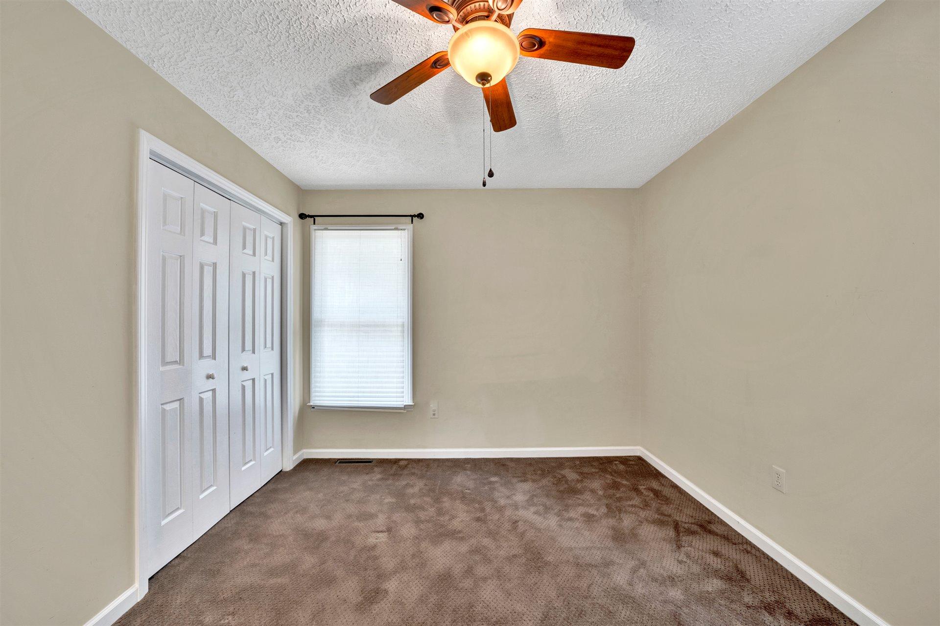 445 Middle Ridge Drive Callaway, VA 24067 - Photo 15 of 25 wooden floor in an empty room with a window