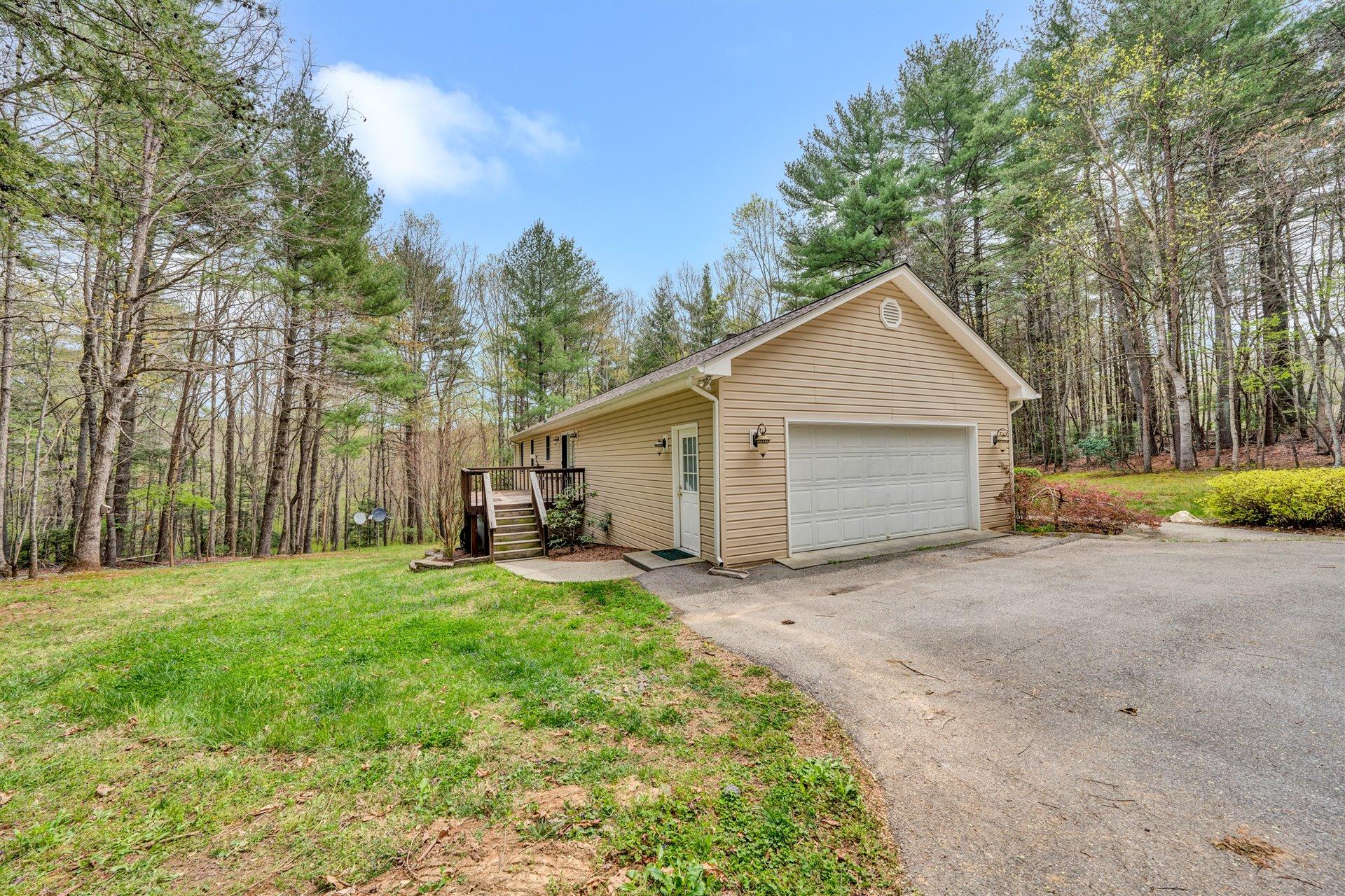 445 Middle Ridge Drive Callaway, VA 24067 - Photo 25 of 25 a view of a house with a yard and large trees