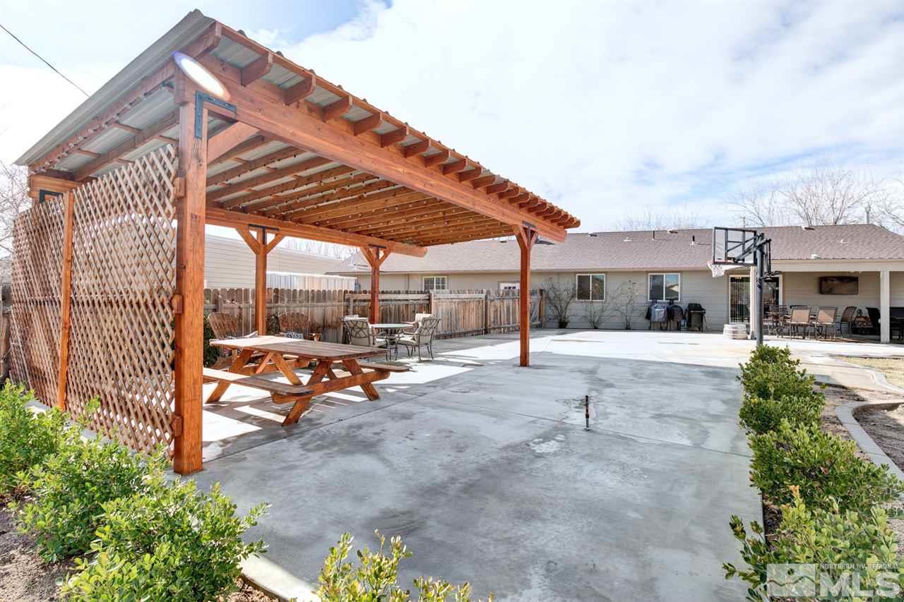 995 McLean Road Fallon, NV 89406 - Photo 22 of 25 a view of a backyard with a sitting area