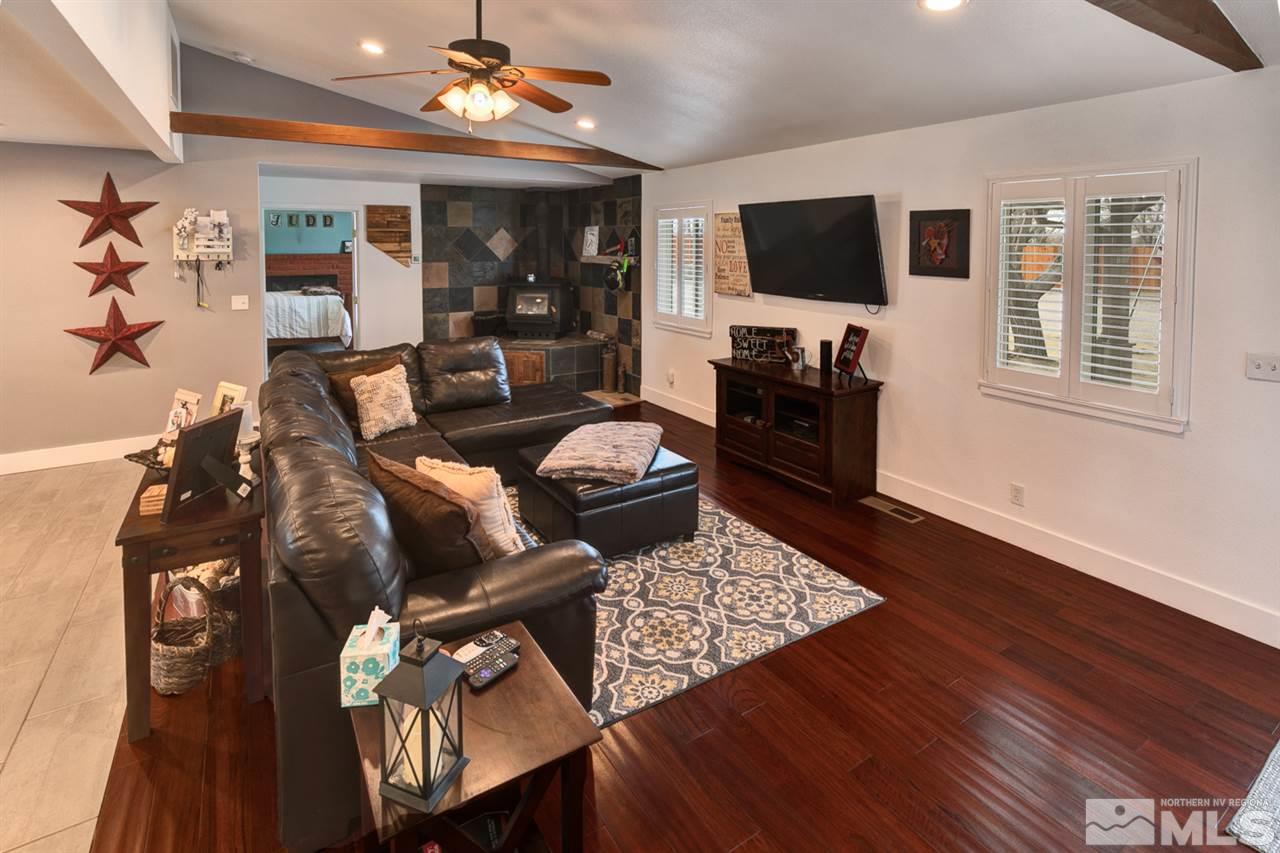 995 McLean Road Fallon, NV 89406 - Photo 3 of 25 a living room with furniture and a flat screen tv