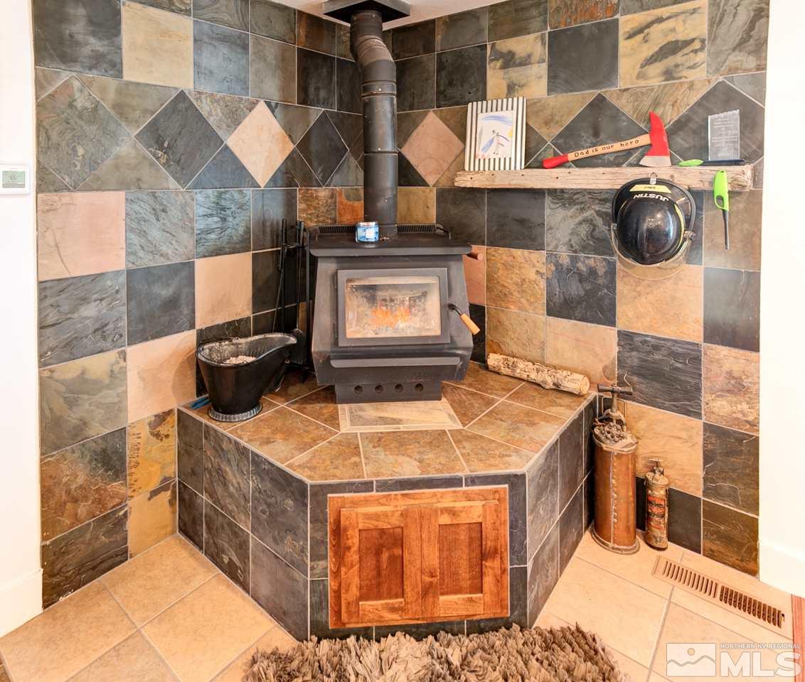 995 McLean Road Fallon, NV 89406 - Photo 4 of 25 a stove top oven sitting inside of a kitchen