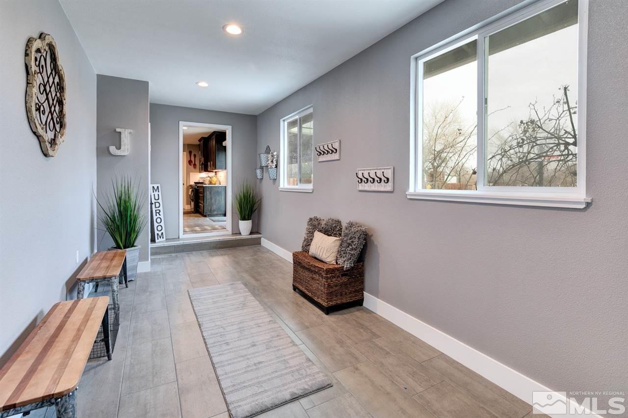 995 McLean Road Fallon, NV 89406 - Photo 8 of 25 a living room with furniture and a large window