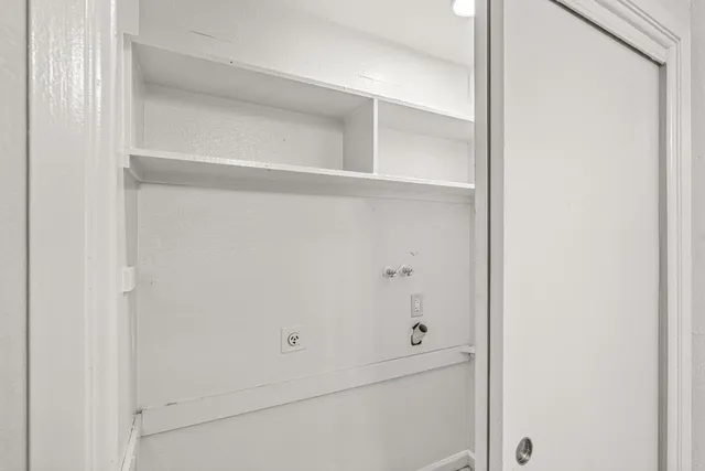 a kitchen that has a lot of cabinets in it