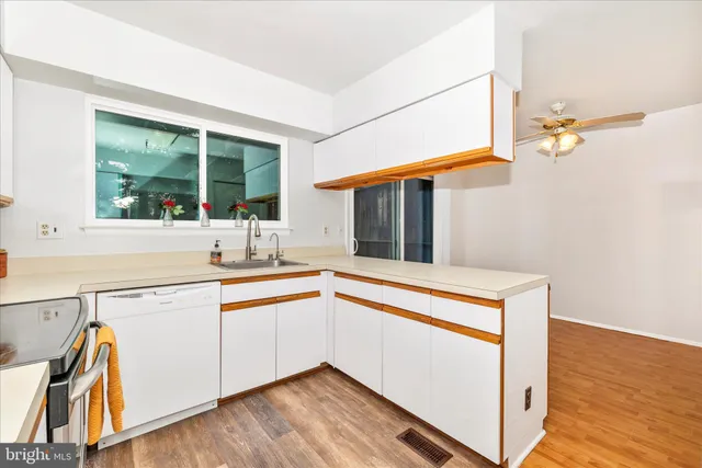 a view of porch with wooden floor and stairs