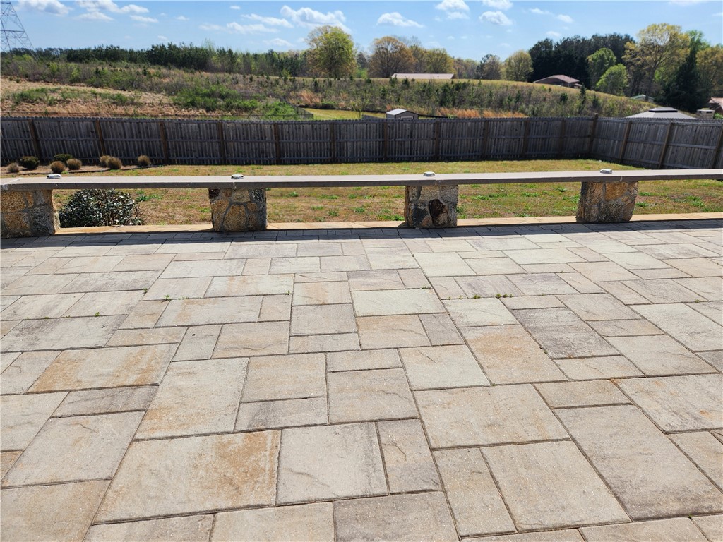 195 Poplar Springs Road Walhalla, SC 29691 - Photo 34 of 47 This spacious paver patio offers an ideal outdoor living space, perfect for entertaining.
