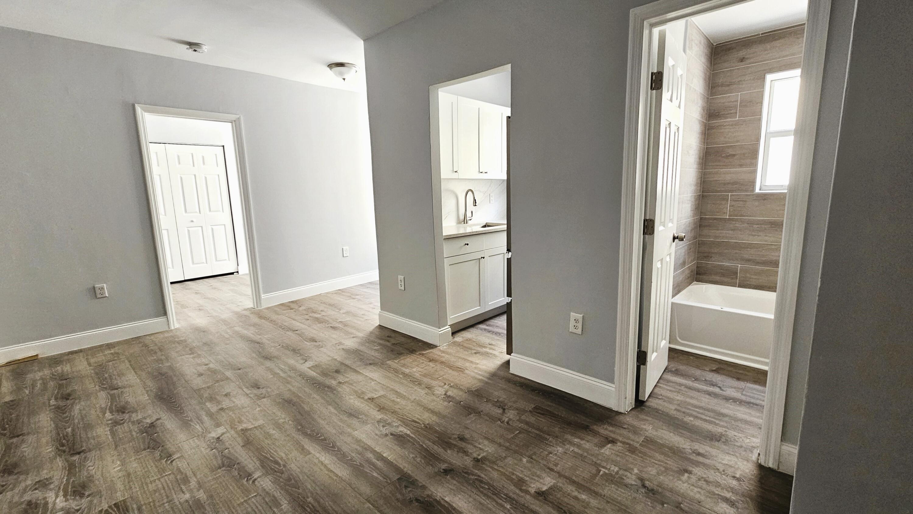 1142 Southwest 4th Street, Unit 9 Miami, FL 33130 - Photo 6 of 9 wooden floor in an empty room