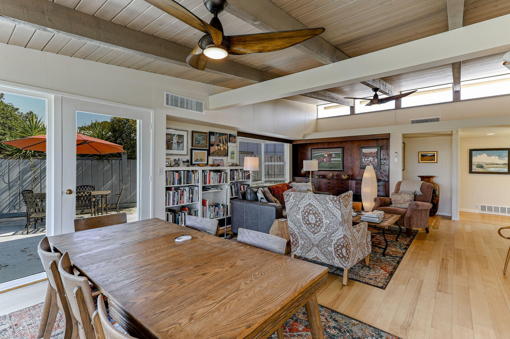 860 Rio Street Red Bluff, CA 96080 - Photo 11 of 50 a living room with furniture a rug and potted plant