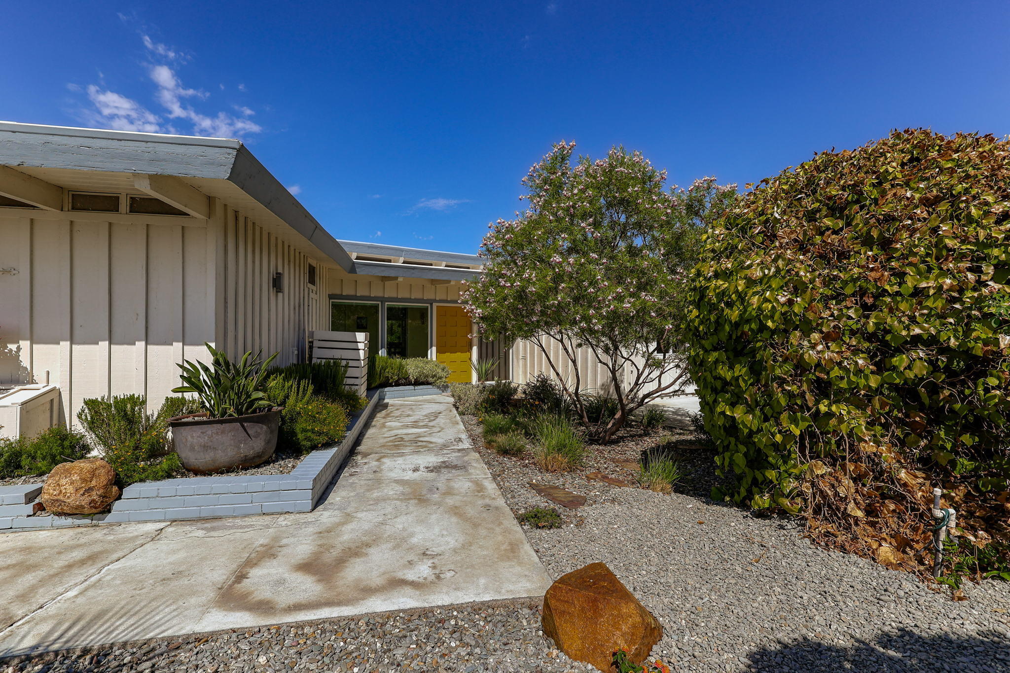 860 Rio Street Red Bluff, CA 96080 - Photo 2 of 50 a view of a backyard with potted plants