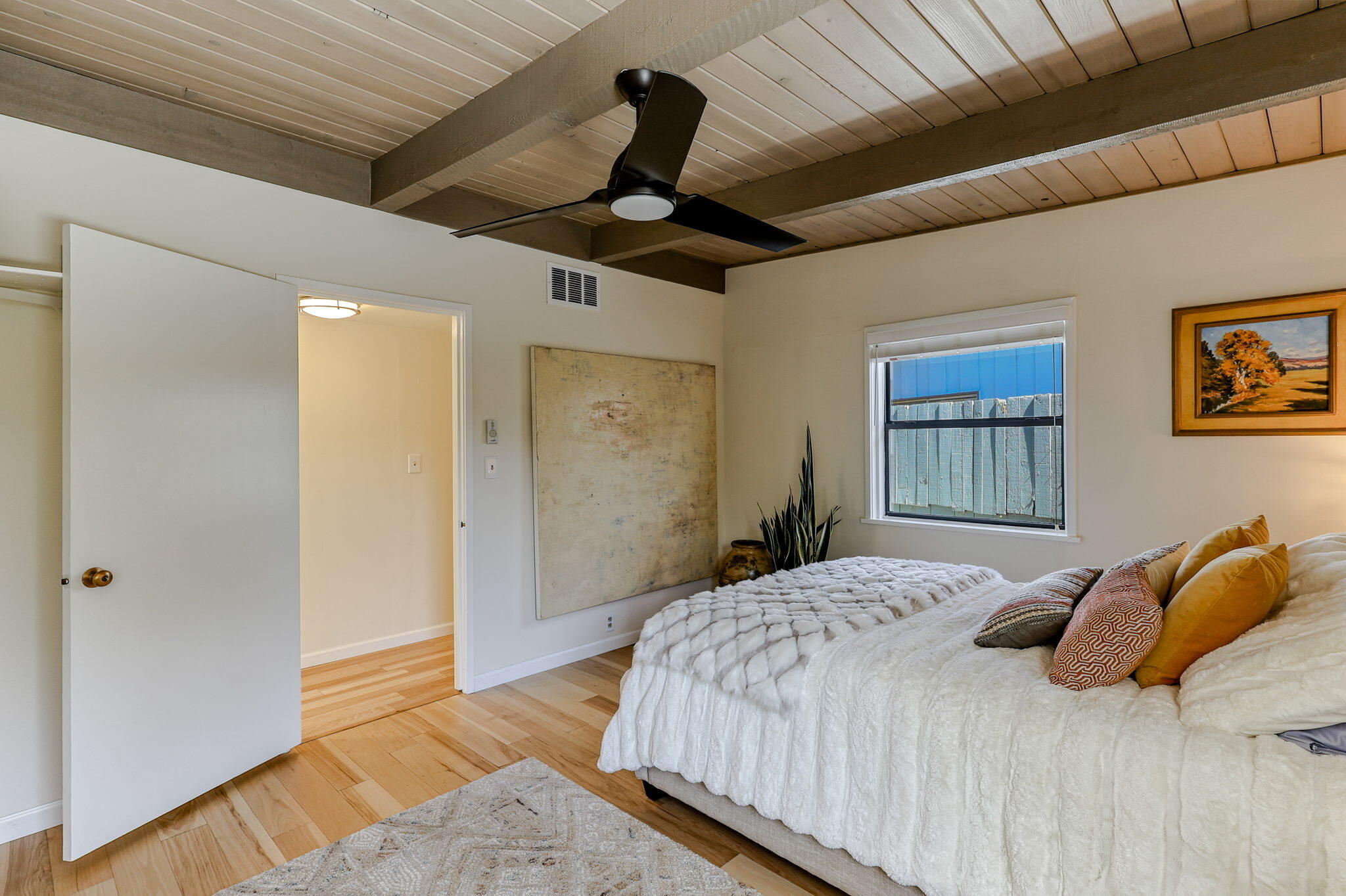 860 Rio Street Red Bluff, CA 96080 - Photo 22 of 50 a bedroom with a bed and a walk in closet