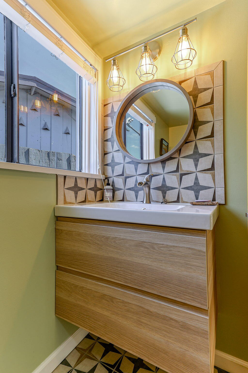 860 Rio Street Red Bluff, CA 96080 - Photo 25 of 50 a bathroom with a sink and a mirror