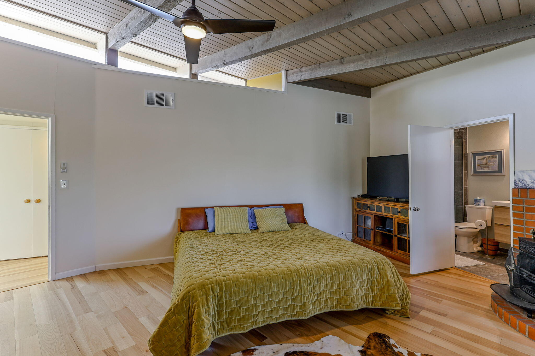 860 Rio Street Red Bluff, CA 96080 - Photo 27 of 50 a bedroom with a bed and a flat screen tv