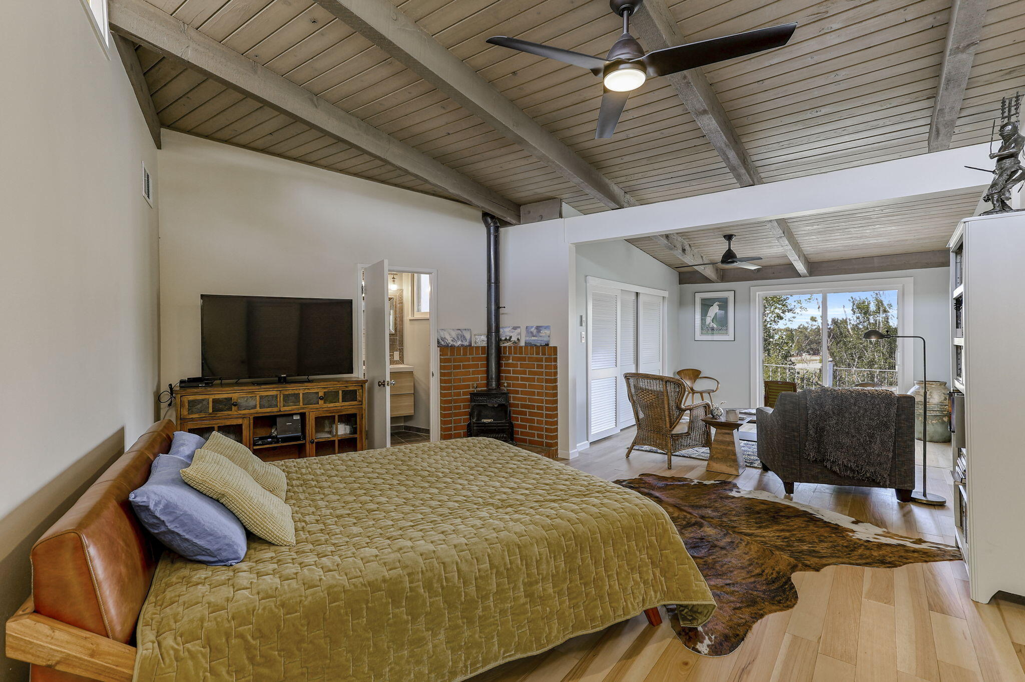 860 Rio Street Red Bluff, CA 96080 - Photo 28 of 50 a bedroom with furniture and a flat screen tv