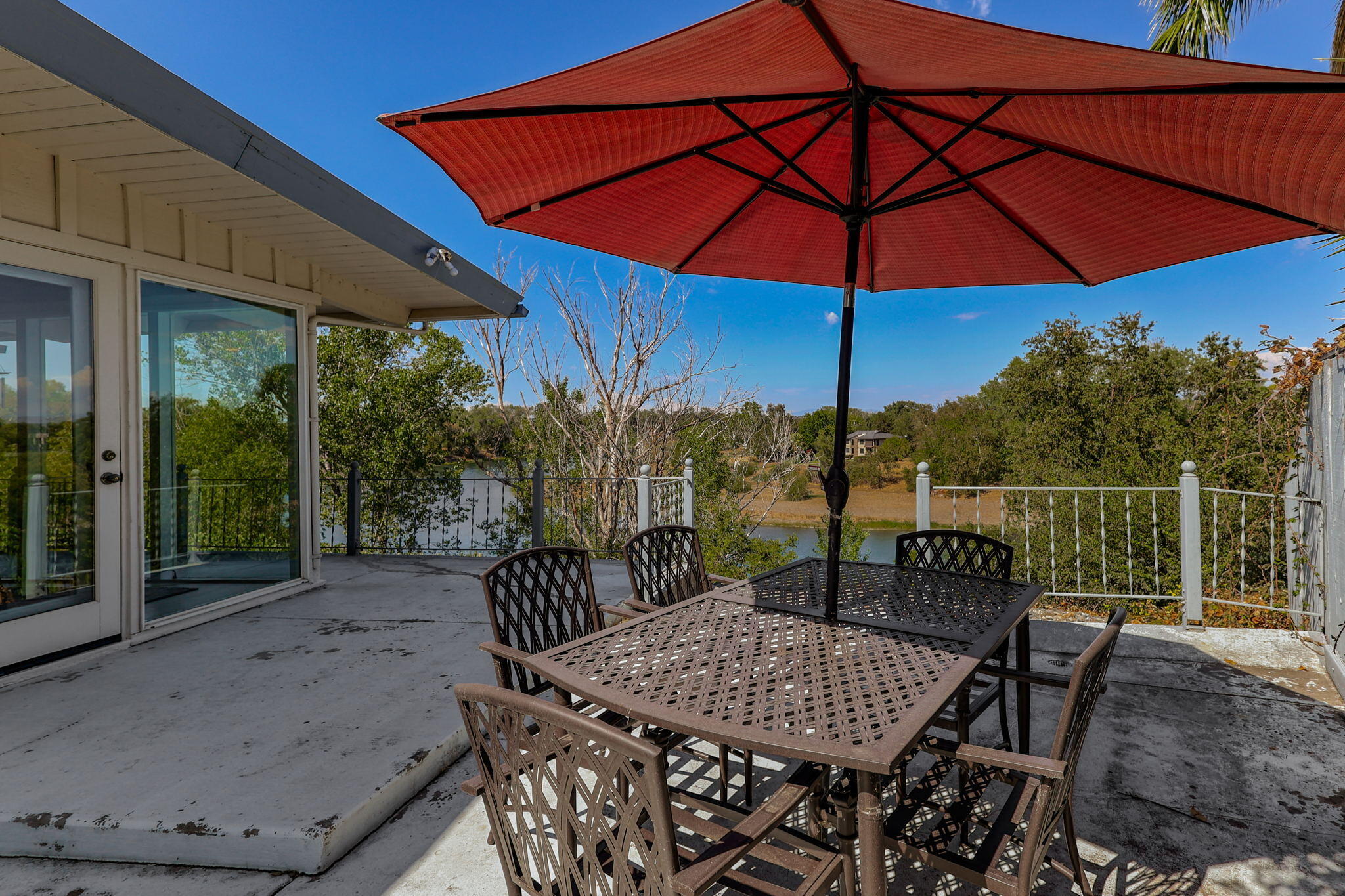 860 Rio Street Red Bluff, CA 96080 - Photo 41 of 50 a view of an outdoor sitting area with furniture and umbrella