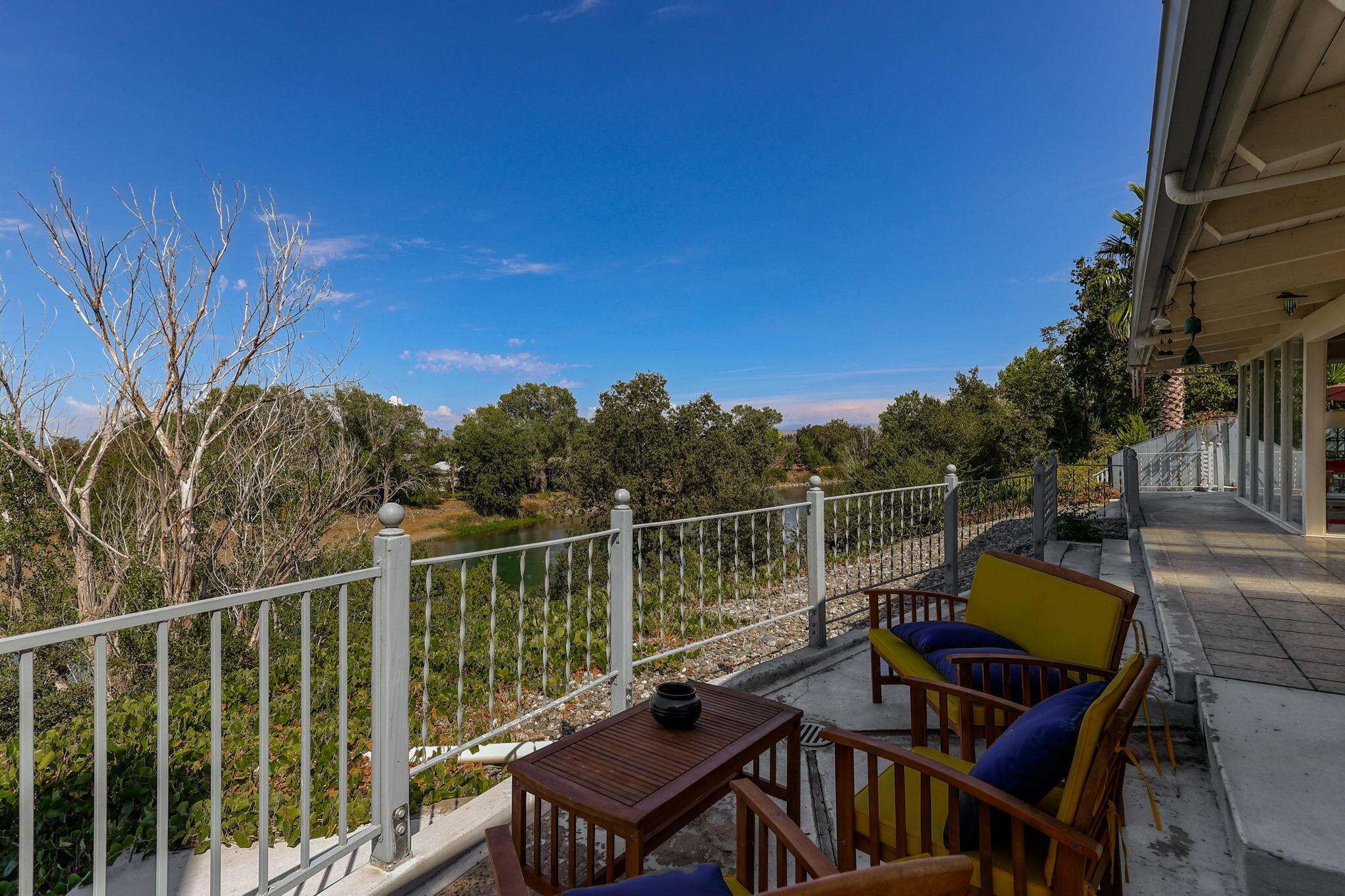 860 Rio Street Red Bluff, CA 96080 - Photo 47 of 50 a view of a balcony with mountain view and wooden floor