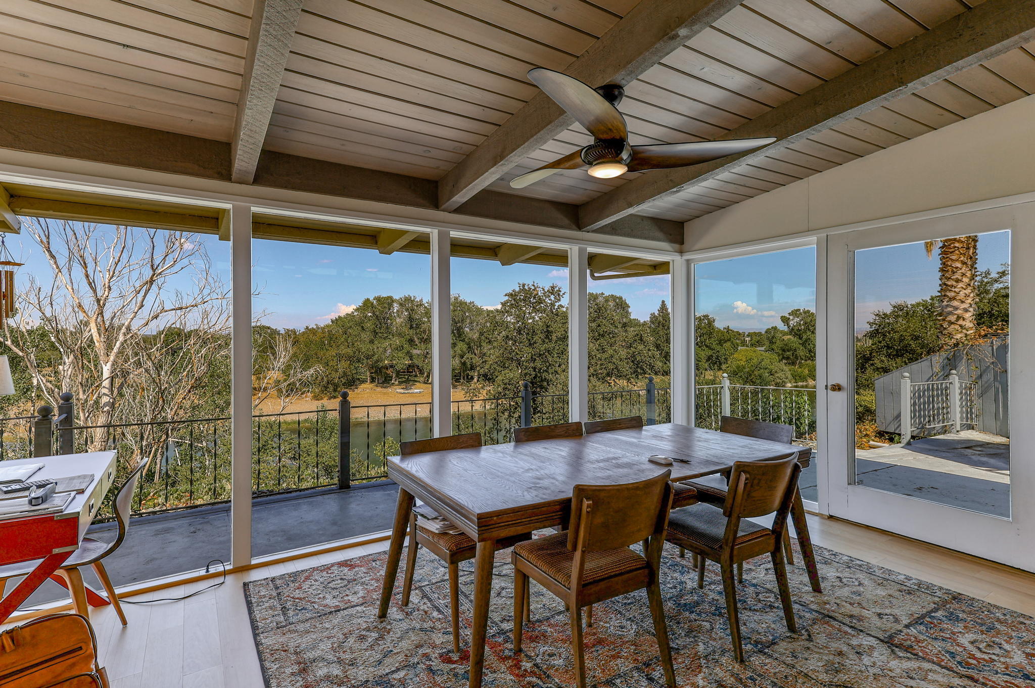 860 Rio Street Red Bluff, CA 96080 - Photo 9 of 50 a view of a outdoor space with furniture and wooden floor